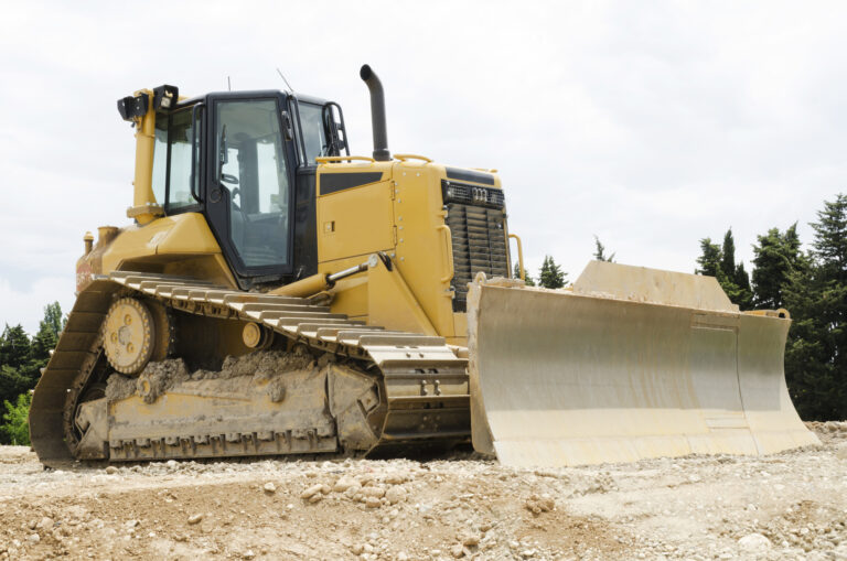 Image of a Cat bulldozer at a worksite.