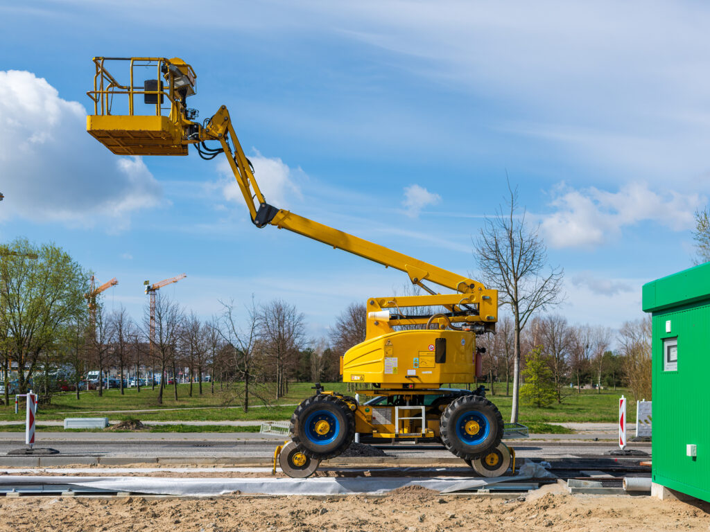 Image of a boom lift at a work site